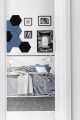 trendy-bedroom-with-comfortable-king-size-bed-modern-flat-real-photo.jpg